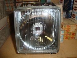 NEW OEM Right Side Hi-Beam Headlight Lens Assembly to fit VW T25 Vanagon/Transporter/Syncro/Westfalia, 1986-1991, as well as VW Scirocco II, 1982-1988.