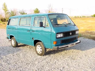Turquoise VW Vanagon, front view