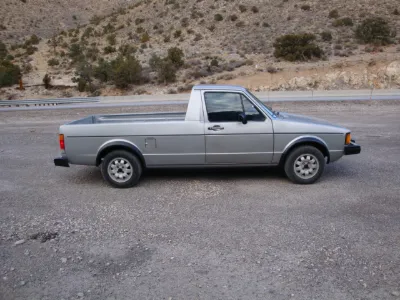 Silver VW Rabbit Pickup, side view