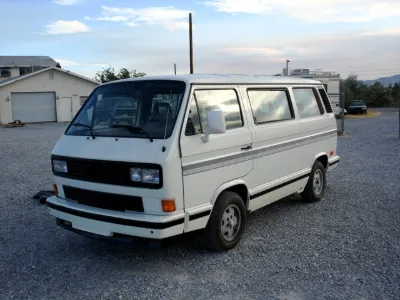 White VW Vanagon on gravel