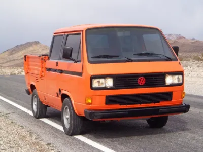 Orange VW T3 double-cab pickup